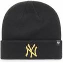 svart-mossa-med-guldlogo-fran-new-york-yankees-mlb-cuff-knit-metallic-av-47-brand