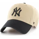 beige-bojd-keps-med-skarm-och-svart-new-york-yankees-logotyp-mlb-clean-up-two-tone-fran-47-brand