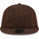 kepsar-plana-brun-justerbart-band-9fifty-av-new-era