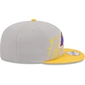 los-angeles-lakers-nba-new-era-gra-och-gul-snapback-9fifty-draft-edition-2023-platt-keps
