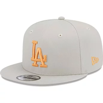 Beige platt snapback-keps med orange logotyp 9FIFTY Sid Patch från Los Angeles Dodgers MLB av New Era