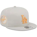 beige-platt-keps-snapback-med-orange-logotyp-9fifty-side-patch-los-angeles-dodgers-mlb-fran-new-era