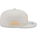beige-flat-snapback-keps-med-orange-logotyp-9fifty-side-patch-new-york-yankees-mlb-fran-new-era