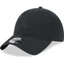 justerbar-svart-bojd-keps-med-svart-logo-9twenty-mini-logo-new-york-yankees-mlb-fran-new-era