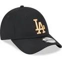 svart-justerbar-bojd-keps-med-guldlogotyp-9forty-league-essential-los-angeles-dodgers-mlb-fran-new-era