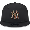 svart-platt-snapback-keps-med-brunt-logo-9fifty-seasonal-infill-fran-new-york-yankees-mlb-av-new-era