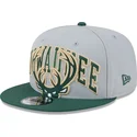 new-era-milwaukee-bucks-nba-9fifty-tip-off-2023-gra-och-gron-snapback-flat-keps