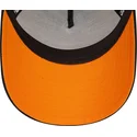 svart-och-orange-9forty-a-frame-patch-front-truckerkeps-fran-mclaren-racing-formula-1-av-new-era