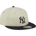 beige-och-marinbla-justerbar-platt-keps-9fifty-retro-crown-denim-fran-new-york-yankees-mlb-av-new-era