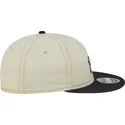 beige-och-marinbla-justerbar-platt-keps-9fifty-retro-crown-denim-fran-new-york-yankees-mlb-av-new-era