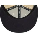 beige-och-marinbla-new-york-yankees-mlb-59fifty-team-colour-anpassad-flat-keps-fran-new-era