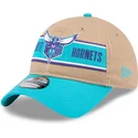 justerbar-brun-och-bla-bojd-keps-9twenty-draft-2024-av-charlotte-hornets-nba-fran-new-era