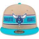 brun-och-bla-platt-keps-snapback-9fifty-draft-2024-fran-charlotte-hornets-nba-av-new-era