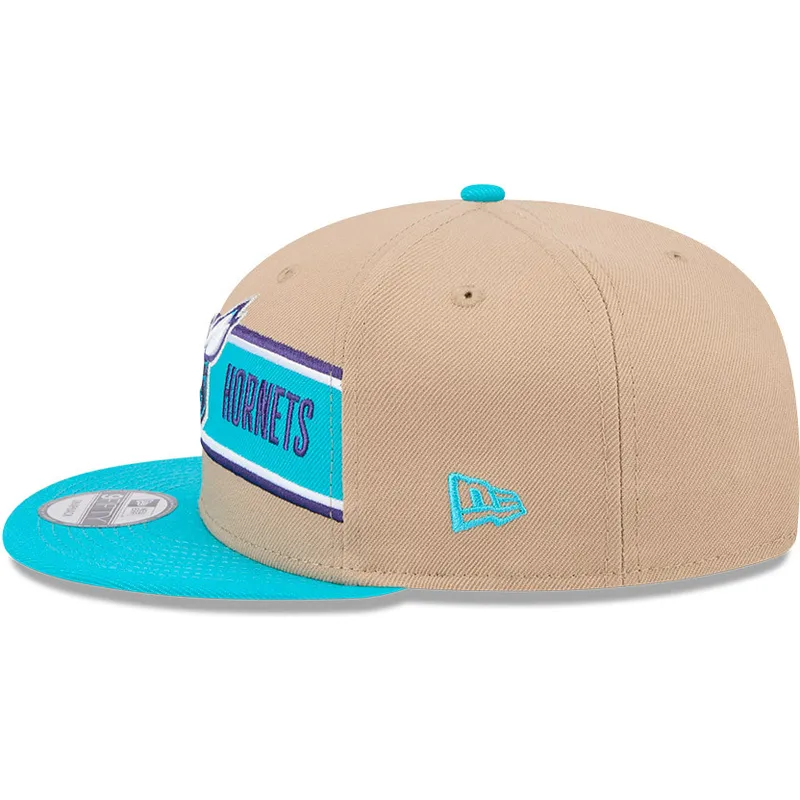 brun-och-bla-platt-keps-snapback-9fifty-draft-2024-fran-charlotte-hornets-nba-av-new-era