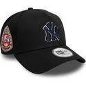 svart-bojd-snapback-keps-med-marinbla-logotyp-9forty-a-frame-world-series-patch-fran-new-york-yankees-mlb-av-new-era