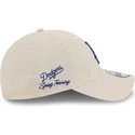 bojd-beige-justerbar-keps-med-bla-logotyp-9twenty-linen-spring-training-fan-pack-2025-fran-los-angeles-dodgers-mlb-av-new-era
