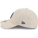 bojd-beige-justerbar-keps-med-marinbla-logotyp-9twenty-linen-spring-training-fan-pack-2025-fran-new-york-yankees-mlb-av-new-era