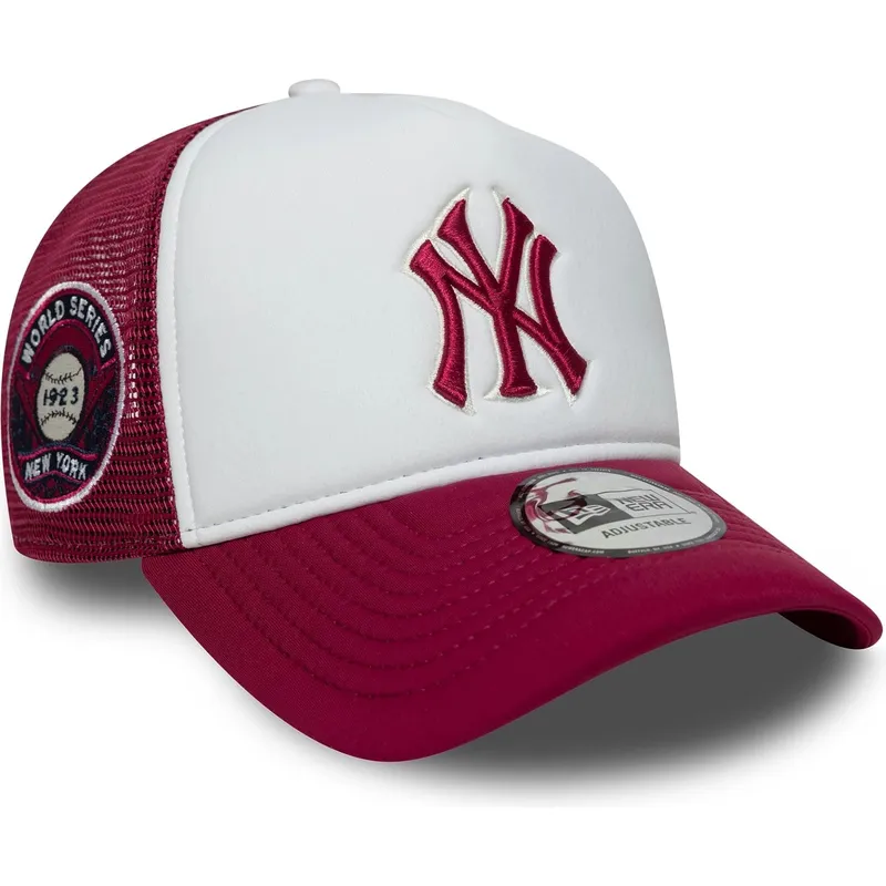 vit-och-rod-trucker-keps-med-rod-e-frame-world-series-logotyp-fran-new-york-yankees-mlb-av-new-era