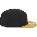 svart-och-gul-platt-keps-med-justerbar-passform-och-gyllene-59fifty-day-logotyp-fran-new-york-yankees-mlb-av-new-era