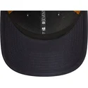 marinbla-och-brun-truckerkeps-9seventy-stretch-snap-debossed-logo-new-york-yankees-mlb-fran-new-era