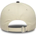 beige-och-marinbla-justerbar-damkeps-9twenty-fran-new-era