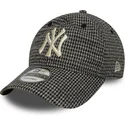 svart-bojd-justerbar-keps-9twenty-houndstooth-fran-new-york-yankees-mlb-av-new-era