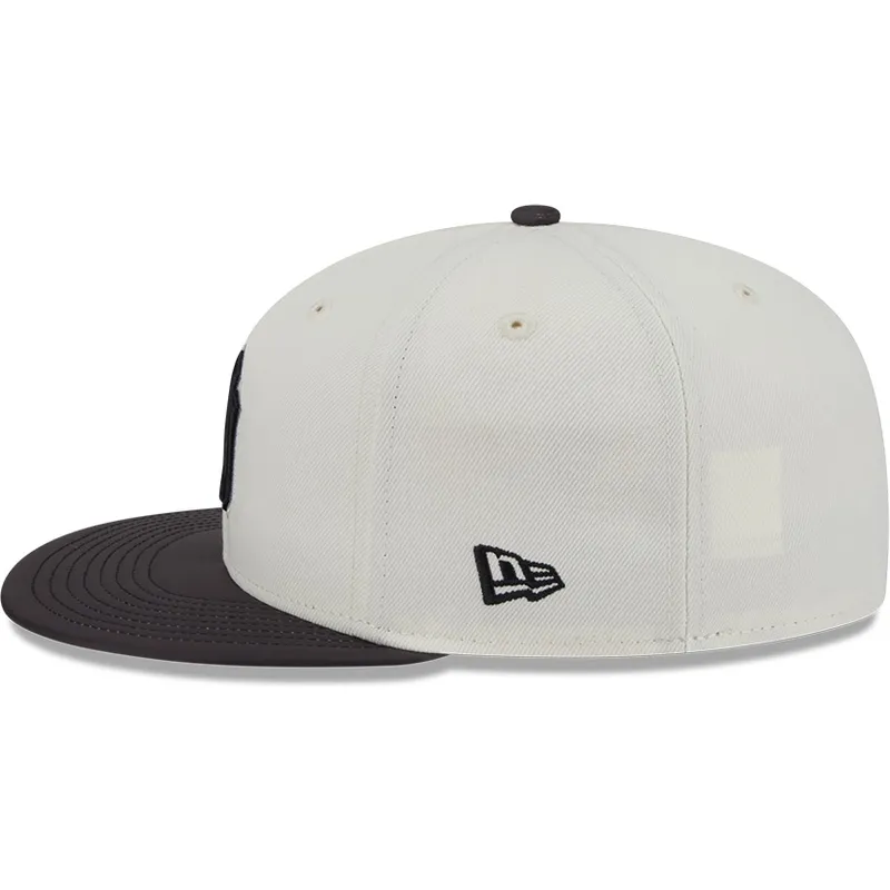 new-york-yankees-mlb-59fifty-clr-dvlp-beige-och-svart-justerbar-flat-keps-fran-new-era