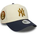 beige-och-marinbla-kurvad-keps-snapback-9forty-e-frame-world-series-patch-new-york-yankees-mlb-fran-new-era
