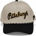beige-och-svart-snapbackkeps-med-bojd-skarm-rise-structured-pittsburgh-pirates-mlb-fran-nike