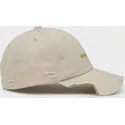 gorra-curva-beige-ajustable-haute-merchandising-the-90s-de-homenage