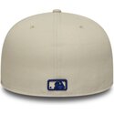 beige-platt-keps-med-justerbar-passform-och-marinbla-logotyp-59fifty-city-icon-new-york-yankees-fran-new-era