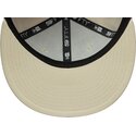 beige-platt-keps-med-justerbar-passform-och-marinbla-logotyp-59fifty-city-icon-new-york-yankees-fran-new-era