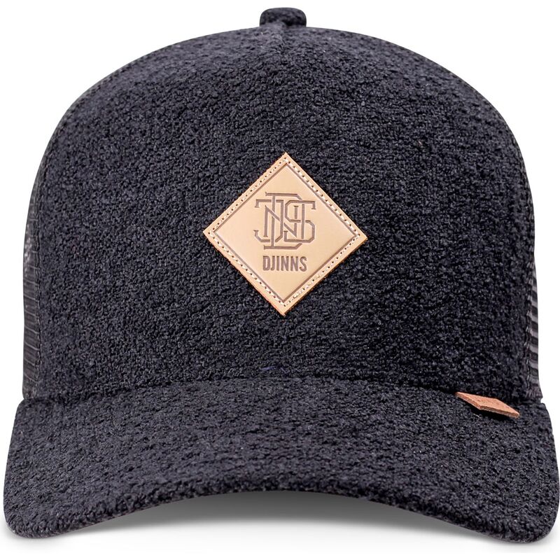 svart-hft-knobfab-trucker-keps-fran-djinns