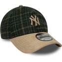 kepsar-bojd-gron-justerbart-band-9twenty-mix-check-fran-new-york-yankees-mlb-av-new-era